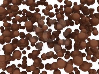 Brown chocolate orbs or balls isolated over white background