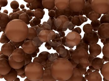 Large chocolate orbs or bubbles isolated over whtie background