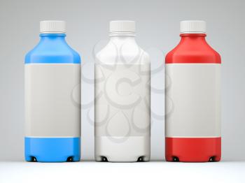 Three colorful  bottles for chemicals or drugs over grey studio background