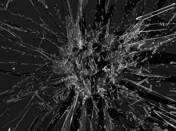 Pieces of broken or Shattered glass on black