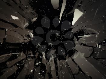 Destructed or shattered glass isolated over black background