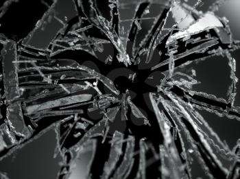 Shattered or demolished glass Pieces isolated over black