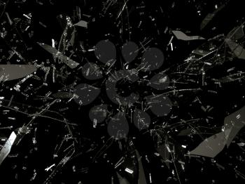 Small and large pieces of shattered black glass on black background