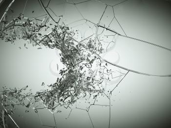 Breaking or demolishing glass on grey vignetted background