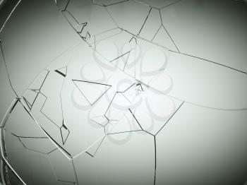 Splitted or cracked glass on grey vignetted background