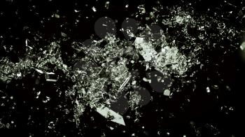 Shattered and cracked glass on black background. Large resolution