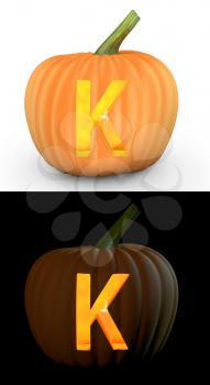 K letter carved on pumpkin jack lantern isolated on and white background