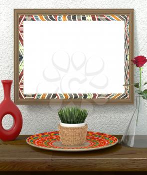 Mock up interior. Frame with bright ethnic ornament on rough plastered walls. Green grass in a pot on a bright African dish. Red Rose in a glass vase. Red vase and dish ethnic, tribal style. 3d render