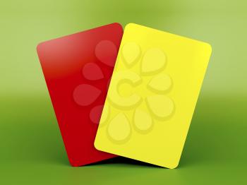 Red and yellow cards on green background