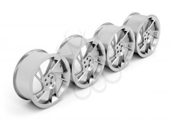 Group of car alloy rims on white background