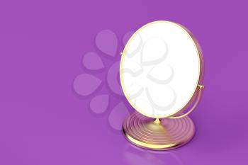 Gold makeup mirror on shiny purple background 