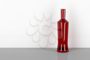 Red bottle for liqueur, vodka or gin