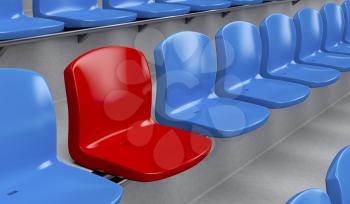 Unique red seat among blue ones