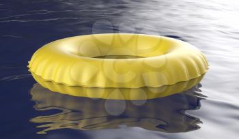 Yellow swim ring floating on water