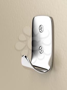 Silver wall hook on brown wall