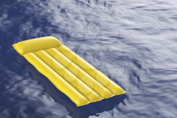 Yellow inflatable pool mattress floating on wavy water 
