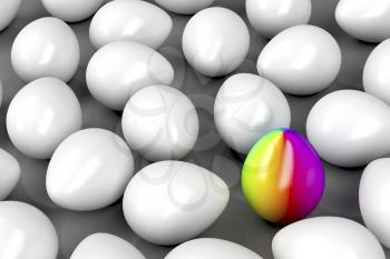 Concept image with one unique colorful egg among other white eggs