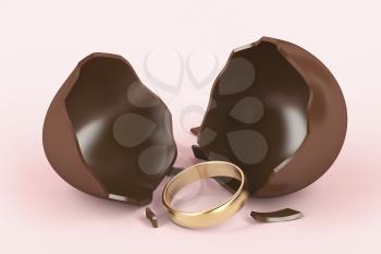 Broken chocolate egg with a surprise, golden engagement ring inside 