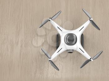 Unmanned aerial vehicle on wood background, top view