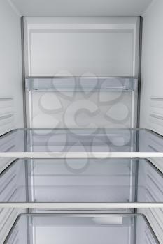 View from inside of an empty fridge with closed door