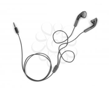 Black wired earphones on white background