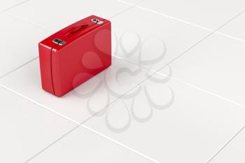 Red suitcase on tile floor 
