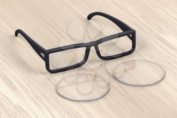 Eyeglasses frame and uncut lens on wood background