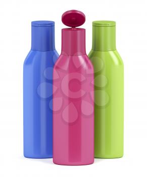 Three plastic bottles for cosmetic liquids with different colors