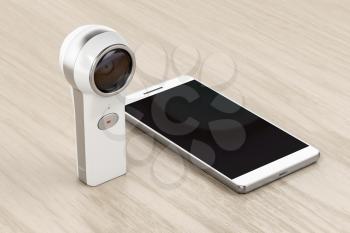 360 degree camera and smartphone on wood background 