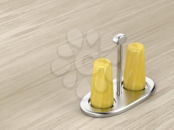 Yellow salt and pepper shakers on the wood table