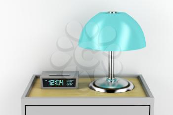 Digital alarm clock and electric lamp on modern nightstand