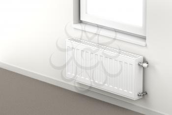 Central heating radiator in the room mounted under the window 