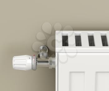 Heating radiator with thermostat valve attached on brown wall
