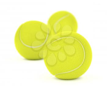 Tennis balls on white background, shallow DOF