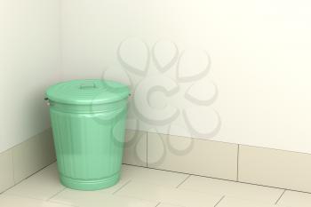 Green garbage bin in the room 