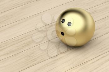 Golden bowling ball on wood floor