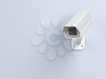 Surveillance camera installed on the wall 