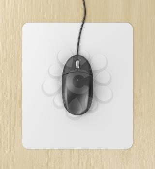 Black computer mouse on a mouse pad, top view
