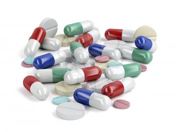 Pile of pills and capsules on white background
