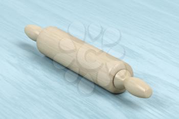 Wooden rolling pin on the table