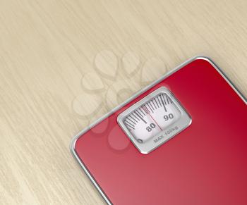 Mechanical weighing scale on wooden floor, close up