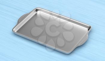 Stainless steel baking pan on wood table