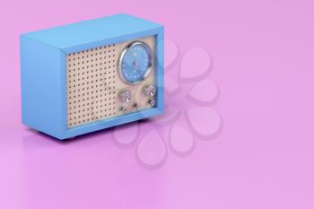 Blue retro radio on shiny pink background