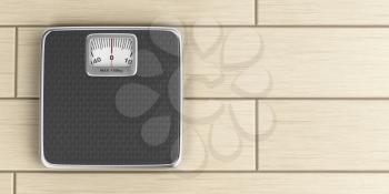 Mechanical weighing scale on the wood floor, top view
