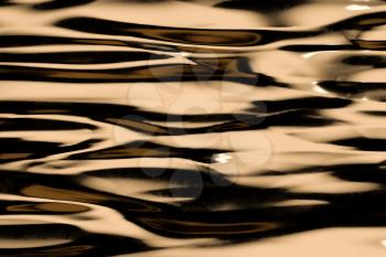 Flowing ripple pattern, golden background, 3d rendering. Computer digital drawing.