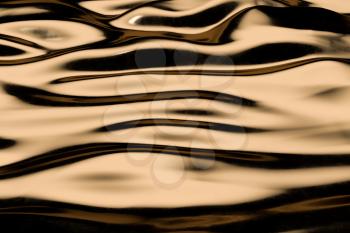 Flowing ripple pattern, golden background, 3d rendering. Computer digital drawing.