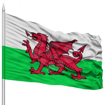 Wales Flag on Flagpole , Flying in the Wind, Isolated on White Background