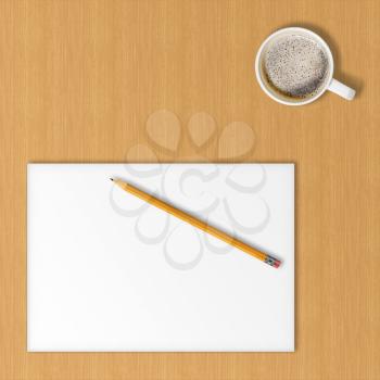 Sheet of office paper, yellow pencil and cup of hot coffee on wooden background with soft shadows.  Above view.