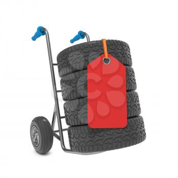 Tires on Hand Truck with Red Label Isolated on White.