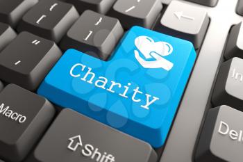 Blue Charity Button on Computer Keyboard. Social Concept.